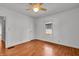 Bright bedroom with hardwood floors, a ceiling fan, and a window that provides natural light at 136 W 43Rd St, Indianapolis, IN 46208