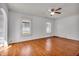 Inviting living room featuring hardwood floors, ample natural light, and neutral tones at 136 W 43Rd St, Indianapolis, IN 46208