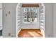 Cozy study with hardwood floors, built-in shelving, and a view of the neighborhood at 136 W 43Rd St, Indianapolis, IN 46208