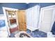 Classic bathroom features a clawfoot tub, blue tile flooring, and vintage accents at 1542 Maple Ave, Noblesville, IN 46060
