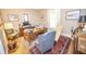 Office space featuring hardwood floors, vintage desk, and natural light, creating an inviting workspace at 1542 Maple Ave, Noblesville, IN 46060