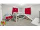 Bright bedroom featuring a unique bunk bed with a slide and playful decor at 1710 Bittersweet Dr, Anderson, IN 46011