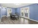 Comfortable dining room with a round table and French doors to the exterior at 1710 Bittersweet Dr, Anderson, IN 46011