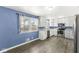 Bright kitchen featuring modern stainless steel appliances and ample counter space at 1710 Bittersweet Dr, Anderson, IN 46011