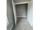 Empty bedroom closet with neutral carpeting and ample space for storage at 1746 Lambert St, Indianapolis, IN 46221