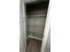 Functional closet featuring wire shelving and durable wood-look flooring at 1746 Lambert St, Indianapolis, IN 46221