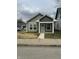 Charming craftsman home with a neatly landscaped front yard and inviting front porch at 1746 Lambert St, Indianapolis, IN 46221