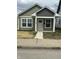 Charming craftsman home with a neatly landscaped front yard and inviting front porch at 1746 Lambert St, Indianapolis, IN 46221