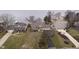 Aerial shot showcasing the waterfront home, expansive lawn, and proximity to the lake at 2005 Dakota Dr, Noblesville, IN 46062
