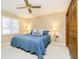 This bedroom features neutral walls, carpeted floors, and a large window with white plantation shutters at 2005 Dakota Dr, Noblesville, IN 46062