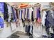 This walk-in closet features wood-style floors and organized storage for clothing at 2005 Dakota Dr, Noblesville, IN 46062