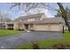 Beautiful two-story home featuring a large driveway and manicured landscaping at 2005 Dakota Dr, Noblesville, IN 46062