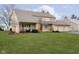 Charming two-story home with a well-kept lawn and classic architectural details at 2005 Dakota Dr, Noblesville, IN 46062
