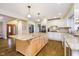 Spacious kitchen features a large island with granite countertops and stainless steel appliances at 2005 Dakota Dr, Noblesville, IN 46062