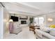 Cozy living room with a white stone fireplace and sliding glass doors at 2005 Dakota Dr, Noblesville, IN 46062