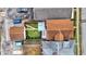 An overhead shot of a home with a well-maintained yard and deck in a neighborhood at 2023 Shelby St, Indianapolis, IN 46203