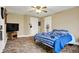Bedroom with sports memorabilia, ceiling fan, and neutral walls at 2023 Shelby St, Indianapolis, IN 46203