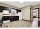 Bright kitchen with ample cabinet space, modern appliances, and a view to the living room at 2023 Shelby St, Indianapolis, IN 46203