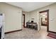 Updated kitchen with tiled flooring, view to living room and eat in kitchen table at 2023 Shelby St, Indianapolis, IN 46203
