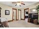 Comfortable living room with neutral carpet, fresh paint and multiple entryways to other rooms at 2023 Shelby St, Indianapolis, IN 46203