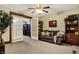 Inviting living room with sofa, bookcase and french doors leading to the home office at 2023 Shelby St, Indianapolis, IN 46203