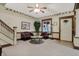 Cozy living room with classic decor, a ceiling fan, and comfortable seating at 2023 Shelby St, Indianapolis, IN 46203