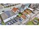 Aerial of neighborhood shows the roof lines of the house and garage and layout of the backyard at 2023 Shelby St, Indianapolis, IN 46203