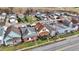 Aerial view of neighborhood shows closely packed houses with mixed roof colors and visible streets at 2023 Shelby St, Indianapolis, IN 46203