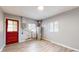 Spacious basement with modern flooring, natural light, and utility connections at 220 Monroe St, Indianapolis, IN 46229