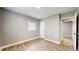 Cozy bedroom with neutral walls, hardwood floors, and good natural light at 220 Monroe St, Indianapolis, IN 46229