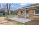 Exterior view of home with a concrete patio at 220 Monroe St, Indianapolis, IN 46229