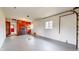 Spacious garage featuring storage cabinets, work areas, and access to the house at 220 Monroe St, Indianapolis, IN 46229