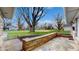 Inviting porch view showcasing stone details and a glimpse of the surrounding neighborhood at 220 Monroe St, Indianapolis, IN 46229