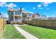 Spacious backyard with lush lawn, walkway, and a charming patio set for outdoor relaxation at 2352 N College Ave, Indianapolis, IN 46205