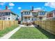 A beautiful backyard with a well-kept lawn and patio set, great for entertaining at 2352 N College Ave, Indianapolis, IN 46205