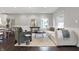 Bright and airy living room with a cozy couch and wainscotting at 2352 N College Ave, Indianapolis, IN 46205