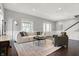 Bright and spacious living room featuring hardwood floors, and neutral wall colors at 2352 N College Ave, Indianapolis, IN 46205