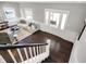 Open-concept living room with hardwood floors, and access to the outdoor deck at 2352 N College Ave, Indianapolis, IN 46205