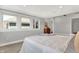 Comfortable main bedroom with a large window offering ample natural light at 2352 N College Ave, Indianapolis, IN 46205