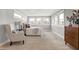 Light-filled main bedroom with ample windows and hardwood furniture at 2352 N College Ave, Indianapolis, IN 46205