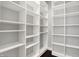 White shelving provides tons of storage space and organization in this home at 2352 N College Ave, Indianapolis, IN 46205