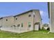 Generous backyard featuring a white fenced deck and storage shed at 2468 Shadow Bend Dr, Columbus, IN 47201
