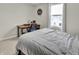 Bedroom area with desk and view of neighborhood at 2468 Shadow Bend Dr, Columbus, IN 47201