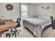 Bedroom area with desk and neutral gray walls at 2468 Shadow Bend Dr, Columbus, IN 47201