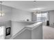 Loft with chandelier, window and view to second room at 2468 Shadow Bend Dr, Columbus, IN 47201