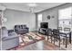 Living Room featuring plush sofas, natural light and hardwood floors at 2468 Shadow Bend Dr, Columbus, IN 47201