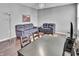 Living Room featuring plush sofas, natural light and hardwood floors at 2468 Shadow Bend Dr, Columbus, IN 47201