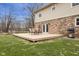 Backyard with a wood deck featuring an outdoor table and a BBQ grill at 2539 S Edgewood Cv, Martinsville, IN 46151