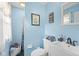 Charming bathroom with blue walls and modern fixtures, creating a relaxing atmosphere at 2539 S Edgewood Cv, Martinsville, IN 46151