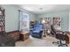 Inviting bedroom features warm colors and built-in bookshelves at 2539 S Edgewood Cv, Martinsville, IN 46151
